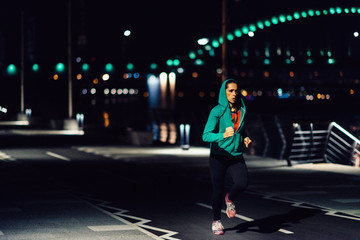 Jogging at night. Woman jogging at night