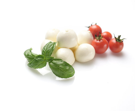 mozzarella, basil and cherry tomatoes on a white background