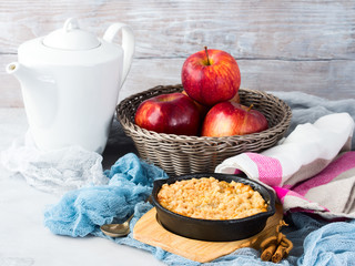 Breakfast with apple crumble in cast iron skillet