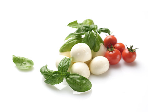 mozzarella, basil and cherry tomatoes on a white background
