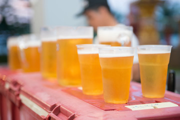 draft beer ready to drink in plastic glass