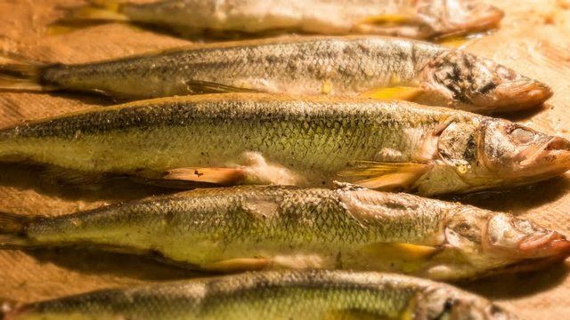 Time lapse cooking fish grilled