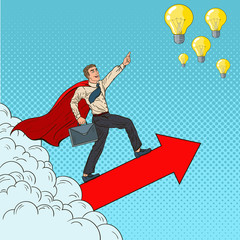 Obraz premium Pop Art Hero Super Businessman Flying through the Clouds to the Ideas. Business Motivation Leadership. Vector illustration