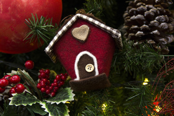 Christmas decoration with balls, flowers, baskets and tree.