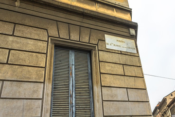 Fototapeta na wymiar square sign in Santa Maria Delle Grazie church in Milan, Italy, hosting The Last Supper mural painting by Leonardo.