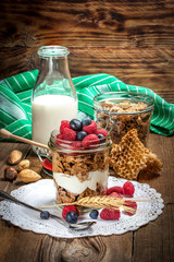 Bowl of cereals with blueberries and raspberrie.