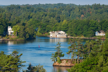 Fototapeta na wymiar Cottages on lake shore