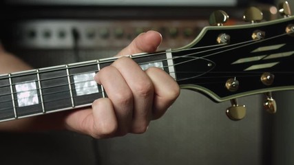 Playing Em chord on six string electric guitar