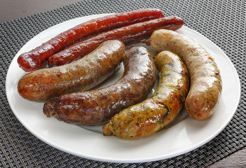 Grilled sausages in the plate