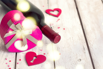 St. Valentine's day background with heart gift and red wine