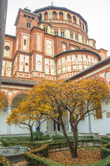 Naklejka premium church Santa Maria Delle Grazie in Milan, Italy, from courtyard vertical view.