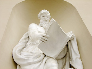 Sculpture of reading Man