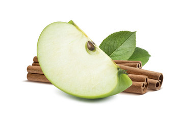 Green apple quarter piece cinnamon in the back isolated