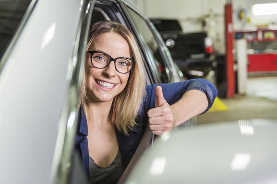 Customer in the garage with repair car
