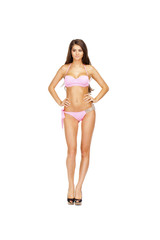Fototapeta premium Snap model. Full length portrait of young woman wearing pink bik