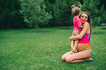 pregnant woman with her daughter