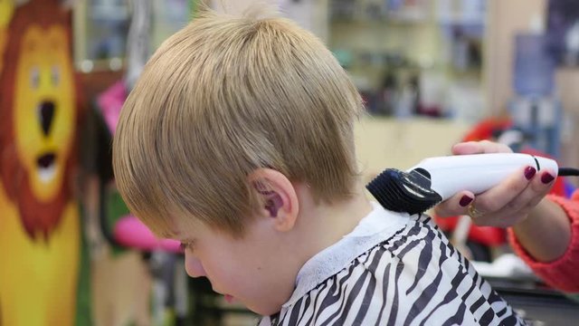 child's haircut at the Barber shop