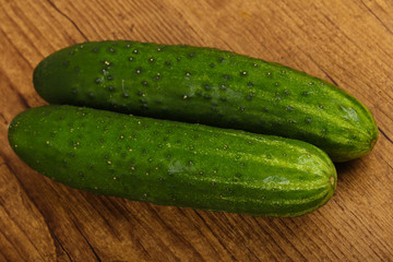 Two green cucumbers