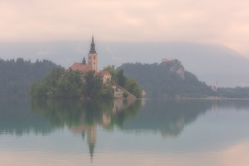 Fototapeta na wymiar Foggy morning at the alpine lake Bled, Slovenia