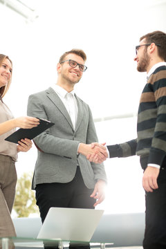 Business people shaking hands, finishing up a meeting