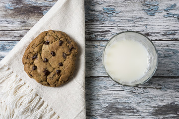 Cookies and Milk / Top View of Cookies and Milk on a Wooden Background