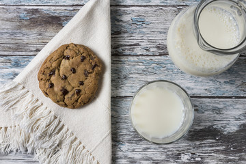 Cookies and Milk / Top View of Cookies and Milk on a Wooden Background