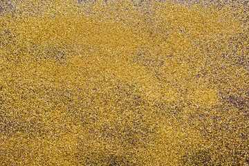 Golden glitter texture abstract background.