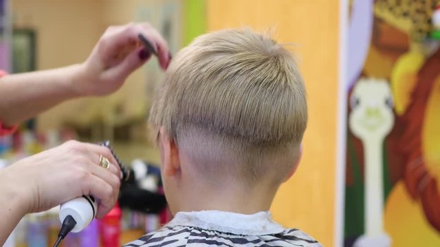 child's haircut at the Barber shop