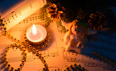 Christmas decorations, candles, figures of angels and notes
