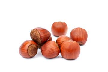 Group hazelnuts isolated on white background