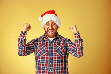 Smiling christmas man wearing a santa hat