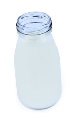 Bottle with milk on white background