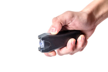 Taser in hand on white background