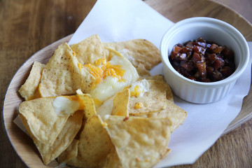 Cheese nachos with tomato sauce