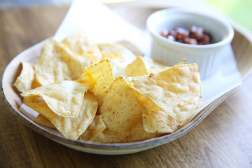 Cheese nachos with tomato sauce