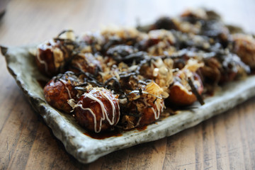 Takoyaki on wood background , japanese food