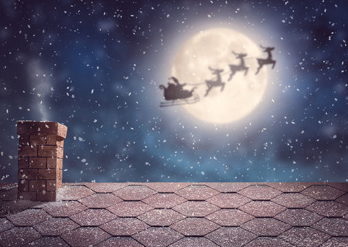 Santa Claus flying in his sleigh