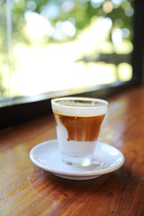 cappuccino coffee on wood background