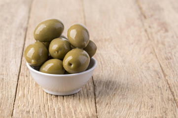pickled green olives in a bowl