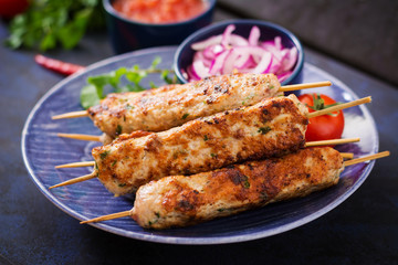 Minced Lula kebab grilled turkey (chicken) on plate.