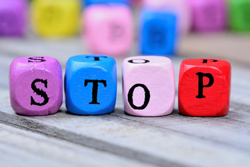 Stop word on wooden table