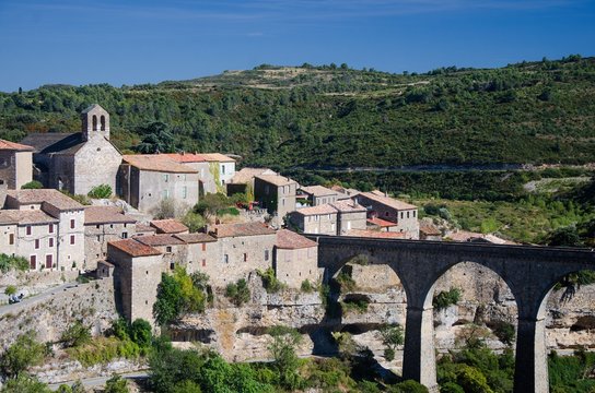 Village and old bridge in southern France