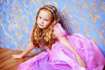 child in luxurious dress