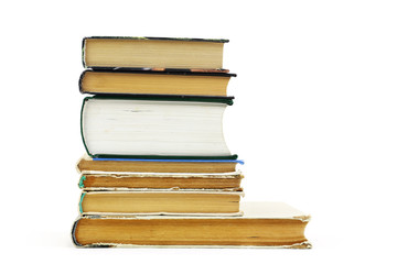 Stack of old books isolated on a white background
