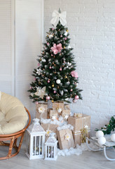 Christmas gifts under a fir-tree. It can be used as a background