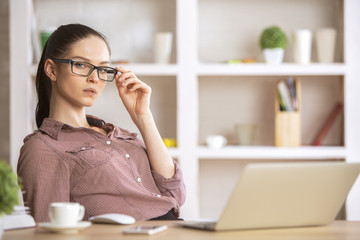 Cute caucasian woman at workplace