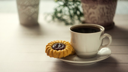 Morning coffee. Espresso on the table in sun light, Breakfast outside