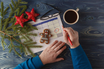 Day 25 of month, calendar on workplace background with morning c