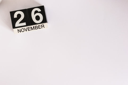 November 26th. Day 26 of month, wooden color calendar on white background. Autumn concept. Empty space for text