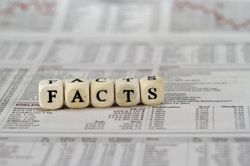 facts word built with letter cubes